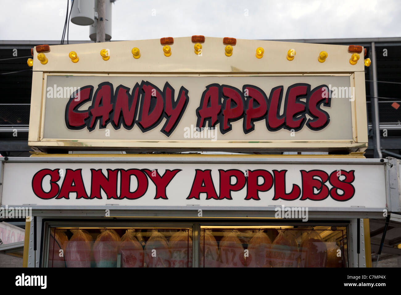 Candy Apple Vendor at county food fair Michigan USA Stock Photo