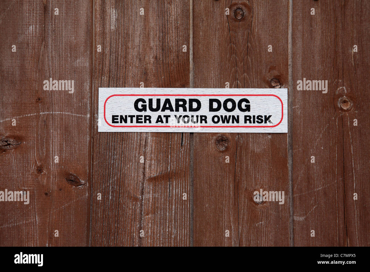 Guard dog sign on a door. Stock Photo