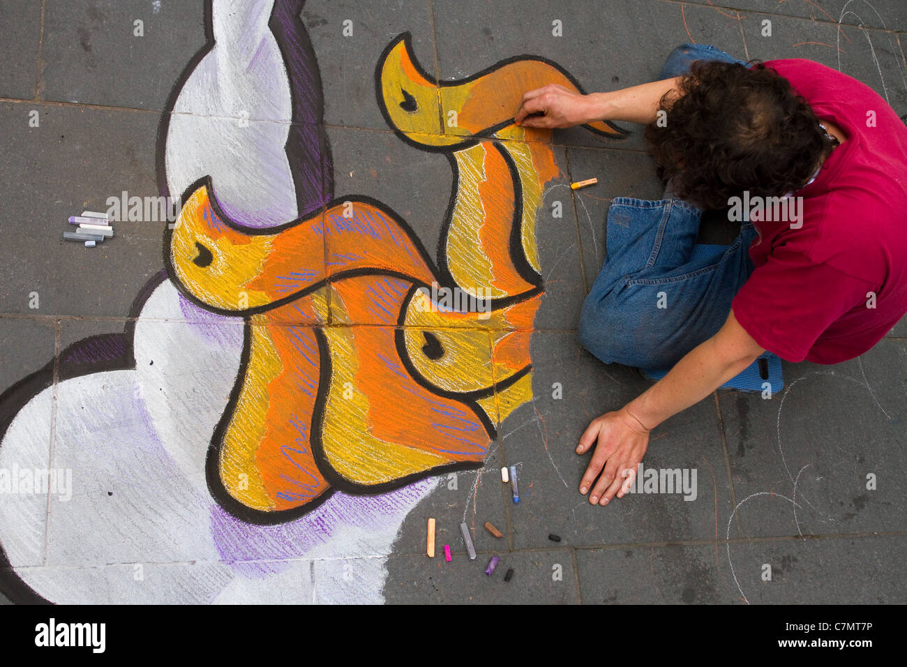 Chalk drawings on pavement surfaces, sidewalk chalk art, stencils