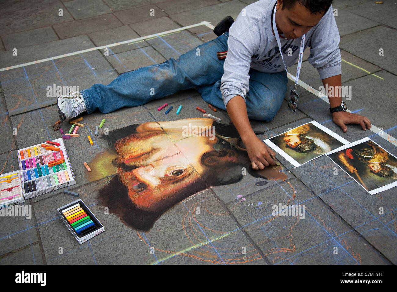 Chalk drawings on pavement surfaces, sidewalk chalk art, stencils