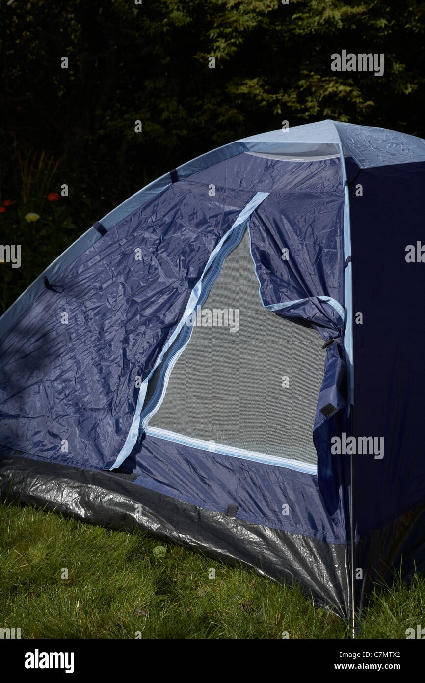 closed mosquito insect net on the front door of a small dome tent Stock Photo