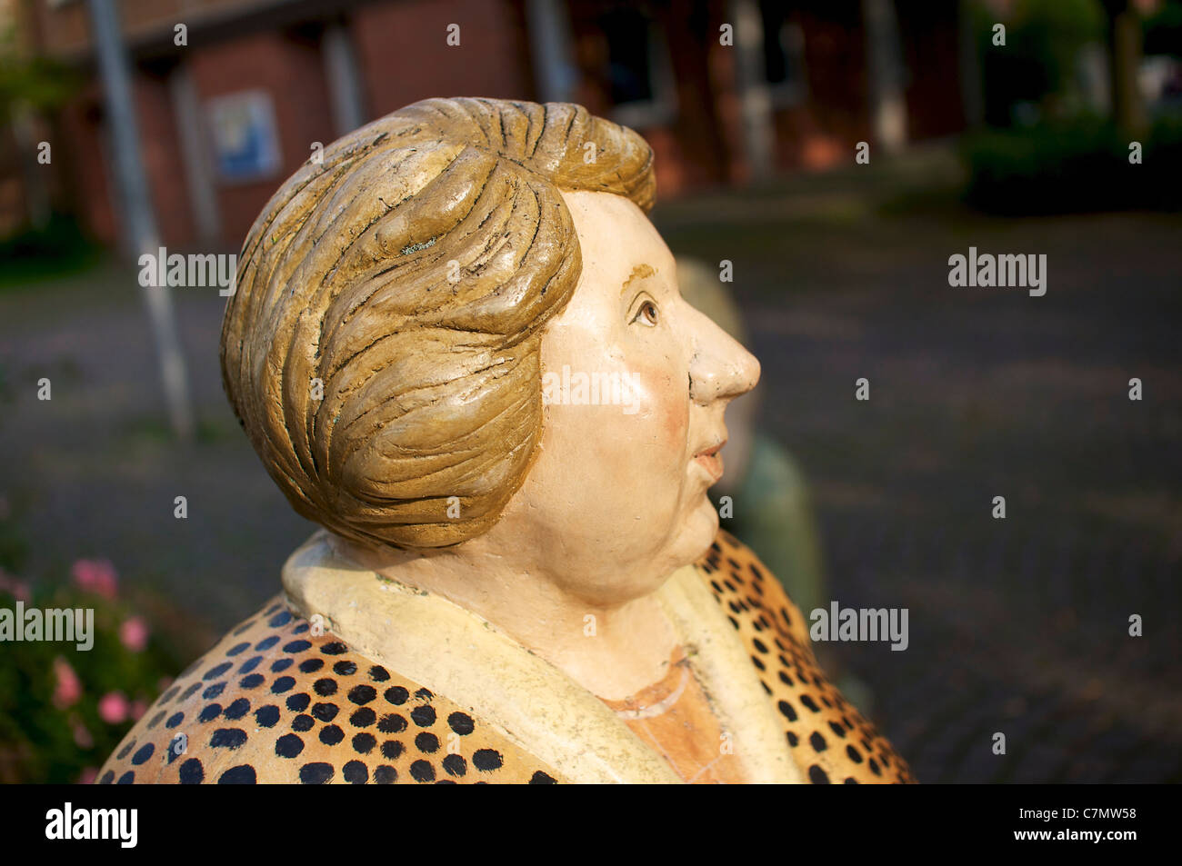 'Frau Peters' , one of the many Lechner figures in the center of Petershagen. Created by the artist Christel Lechner in 2002. Stock Photo