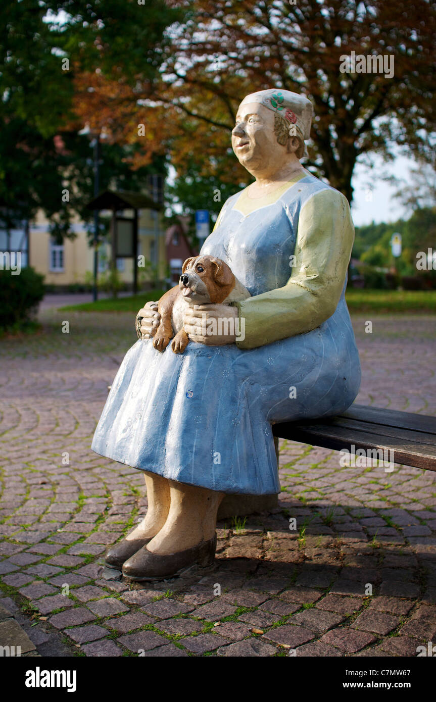 One of the many Lechner figures in the center of Petershagen. Created by the artist Christel Lechner. Stock Photo