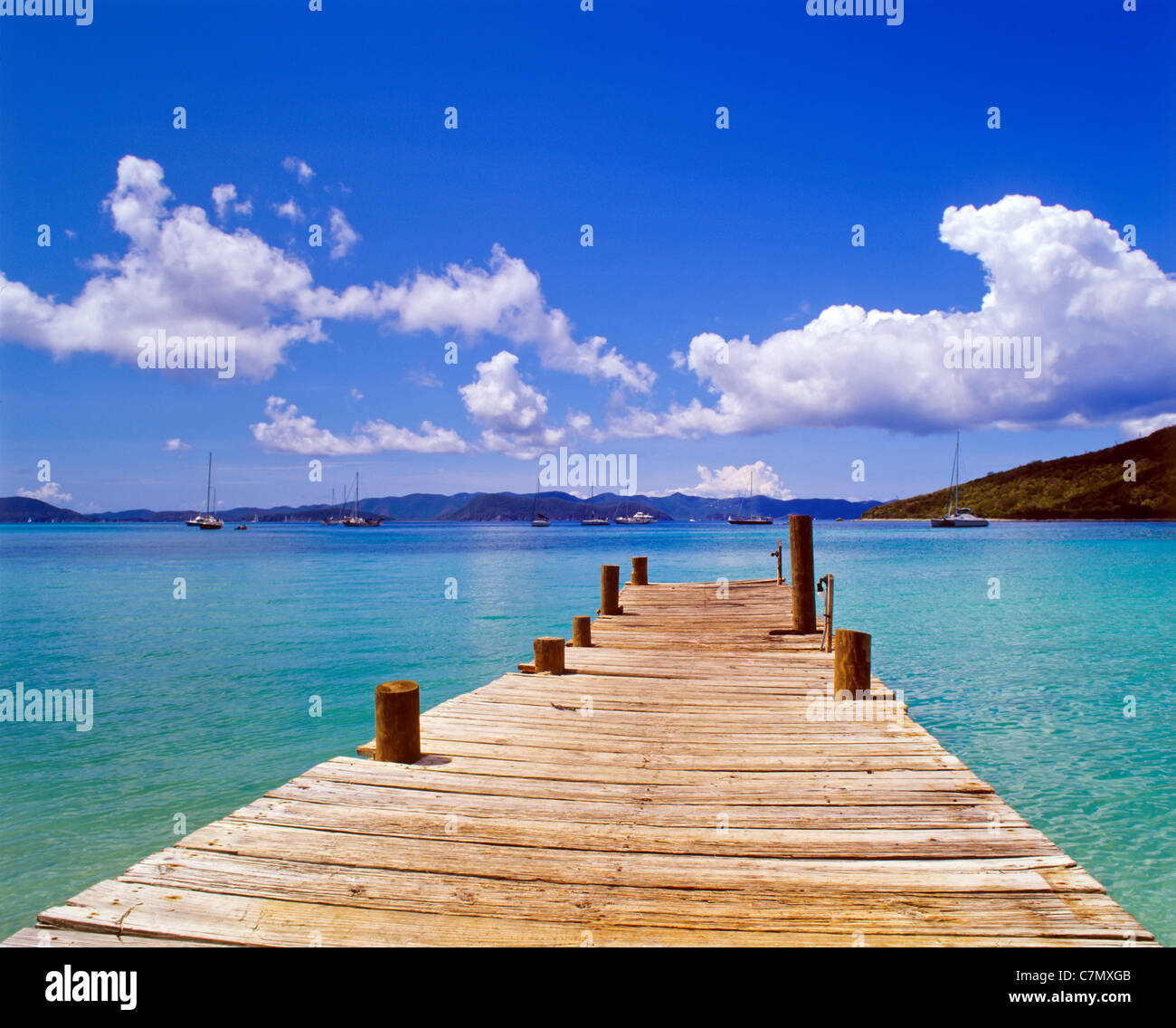Empty dock extending out into the Caribbean Sea on the British Virgin Island of Jost Van Dyke Stock Photo