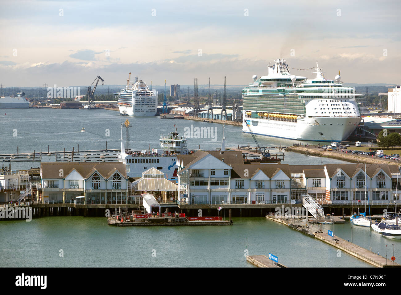 Port of Southampton looking across at a cruise ship loading passengers at the Western docks