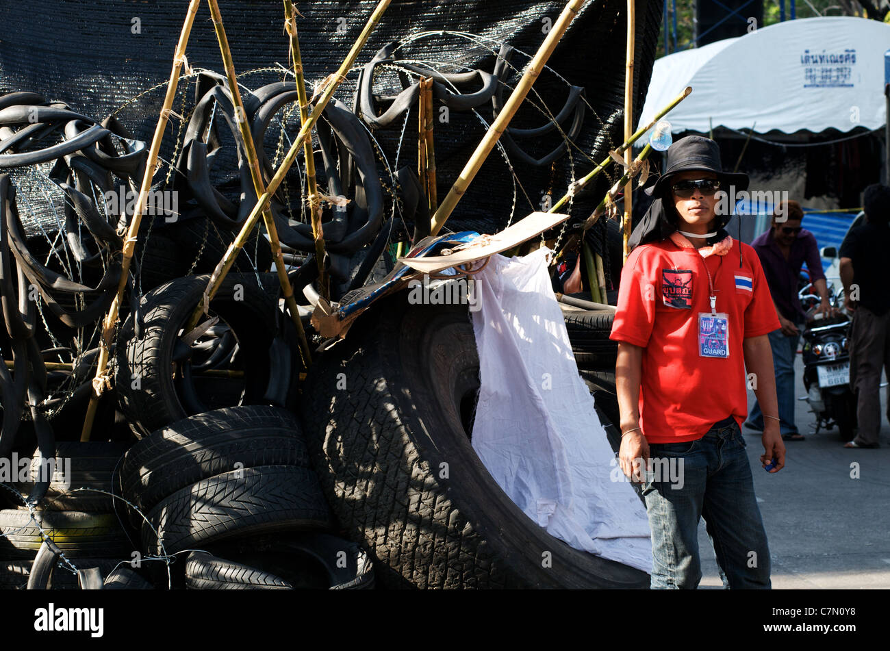 red-shirt-security-guard-in-front-of-bar
