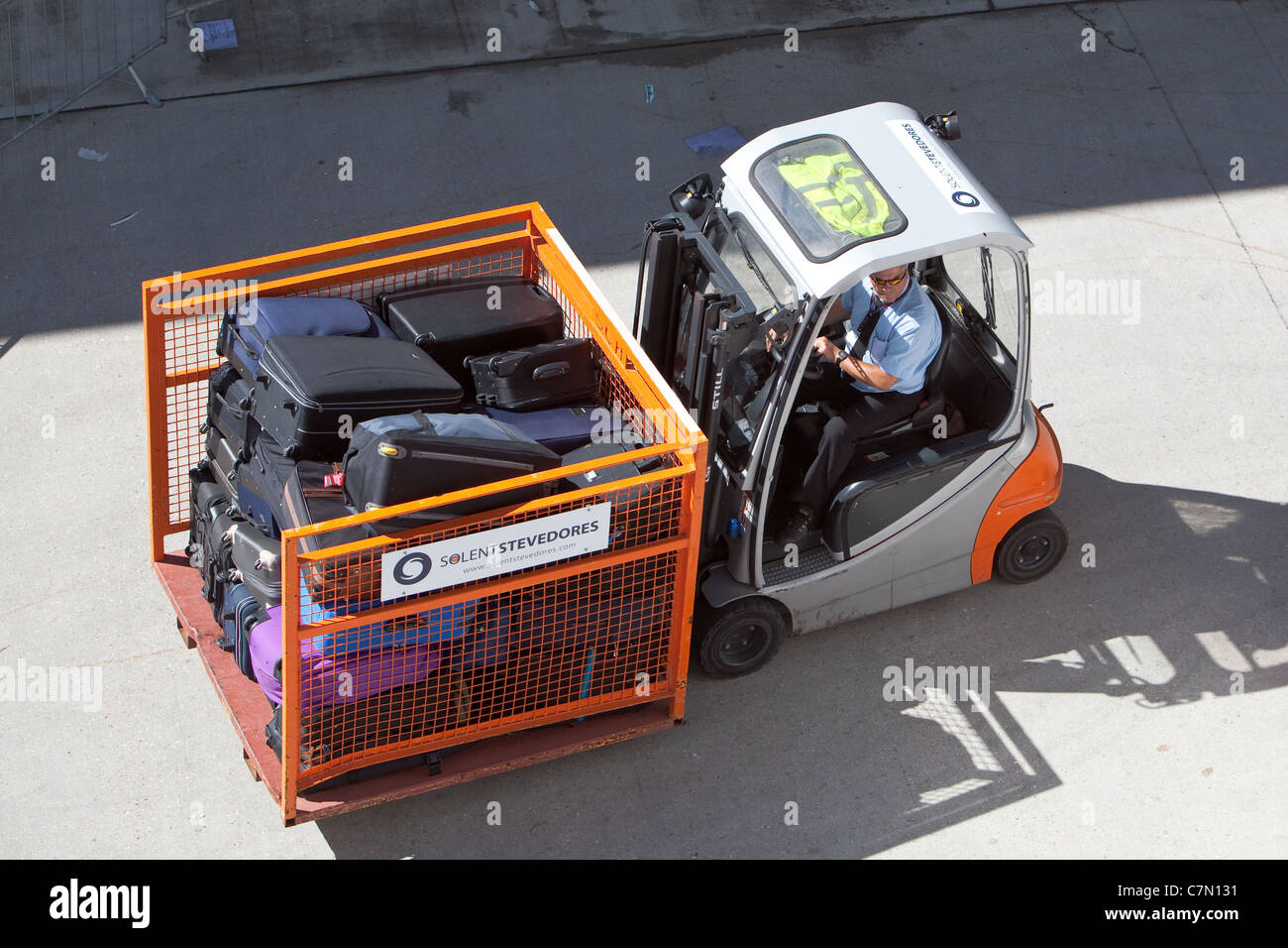 Loading passenger luggage on Cruise Ship. Port of Southampton England