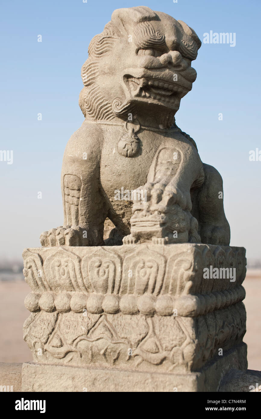 Stone lions on Lugou Qiao (Marco Polo bridge) Stock Photo