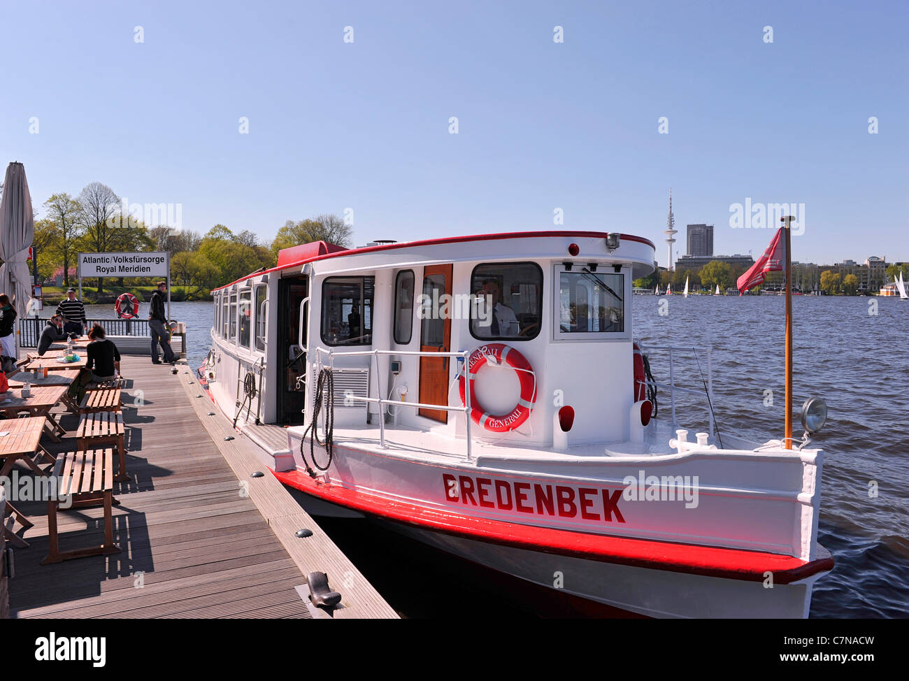 Alster lake ship BREDENBEK docking at the ATLANTIC landing, Aussenalster, Outer Alster lake, Hamburg, Germany, Europe Stock Photo