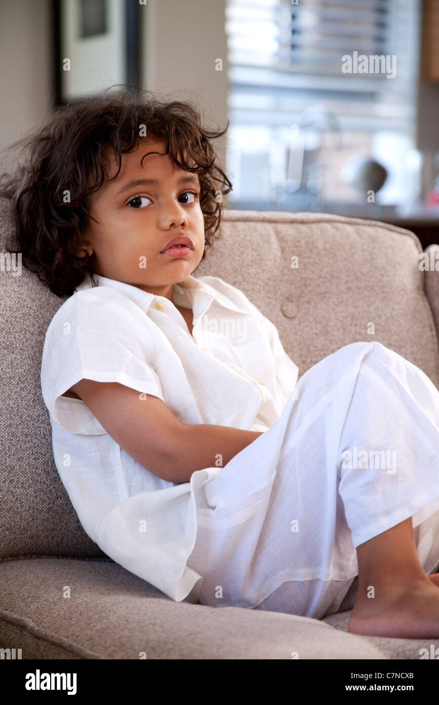 Boy on couch Stock Photo Alamy