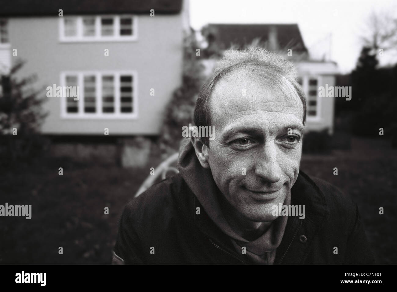 Graham Chapman of Monty Python photographed in his garden in 1987 Stock Photo
