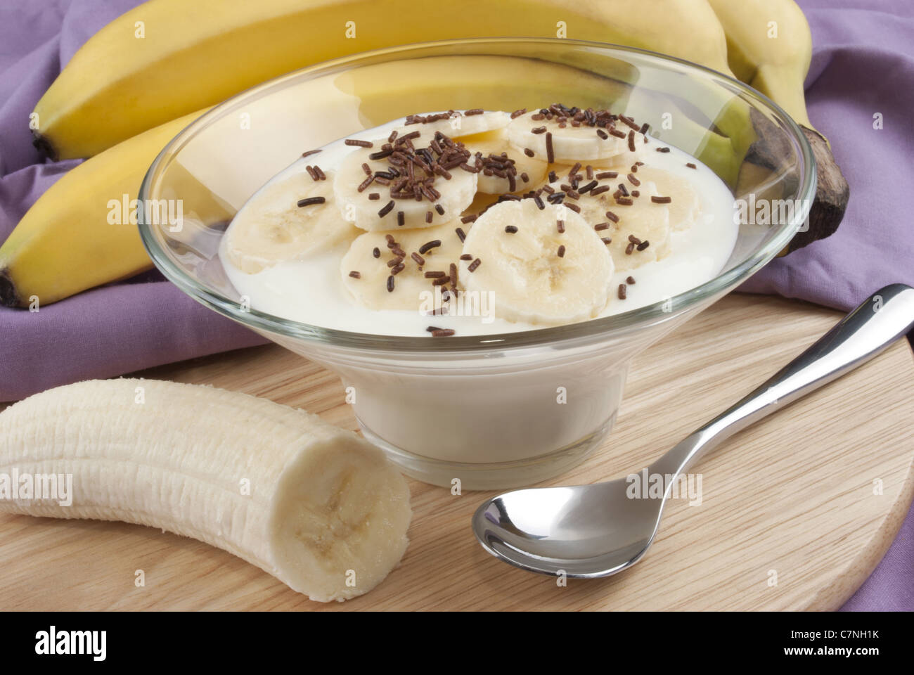 banana slices with fresh yogurt and chocolate sprinkles Stock Photo