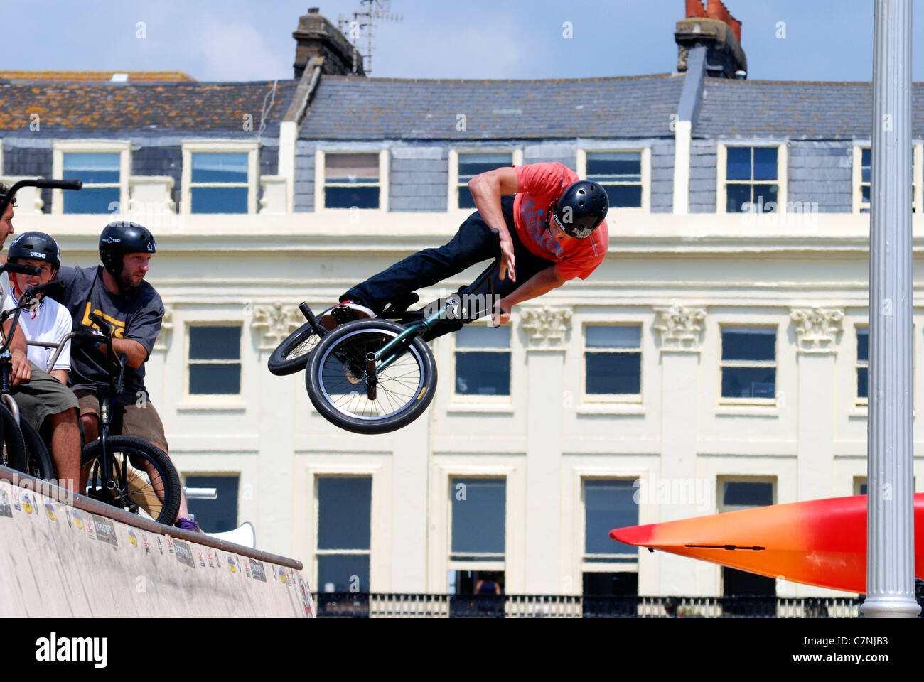 Jumping high on a stunt bike Stock Photo Alamy