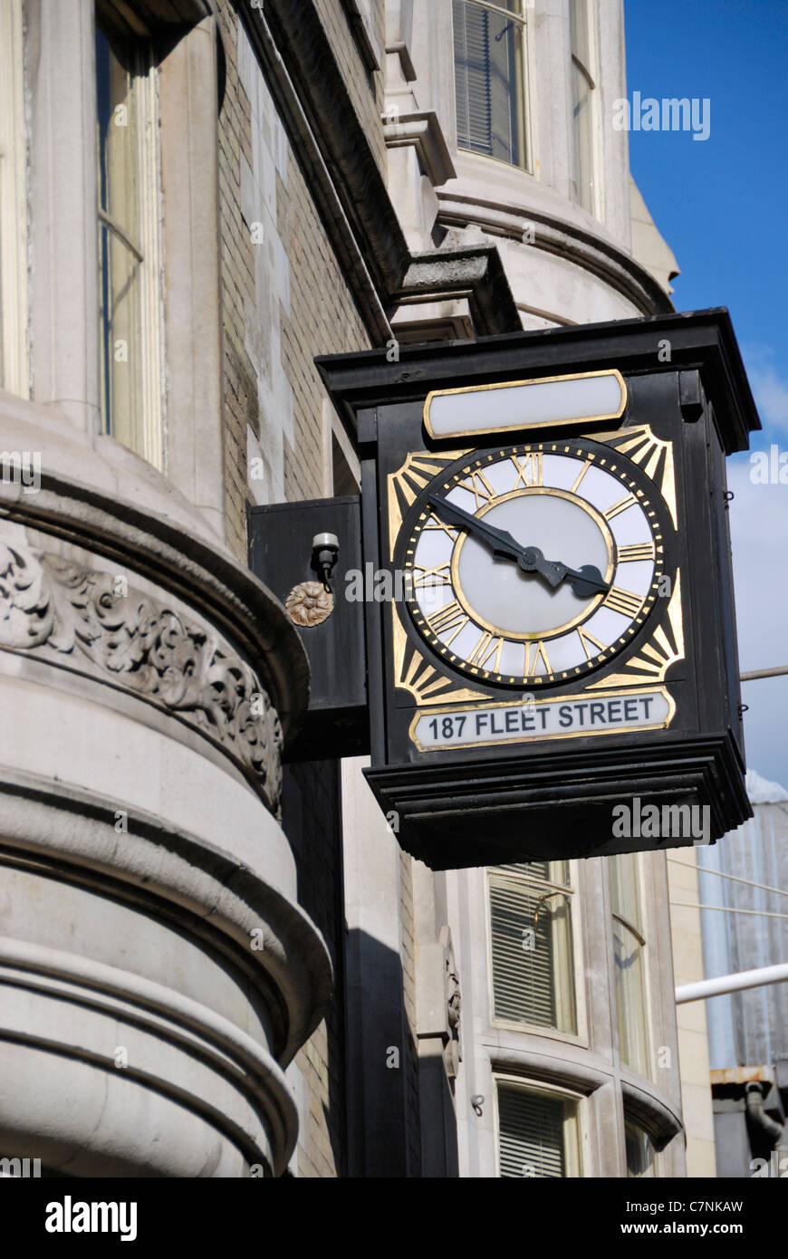 Old clock outside 187 Fleet Street, London, England. The building houses the legal chambers of Andrew Trollope QC. Stock Photo