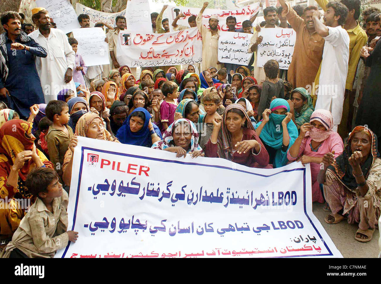 Flood affected people from Sanghar District are protesting in favor of their demands during a demonstration Stock Photo