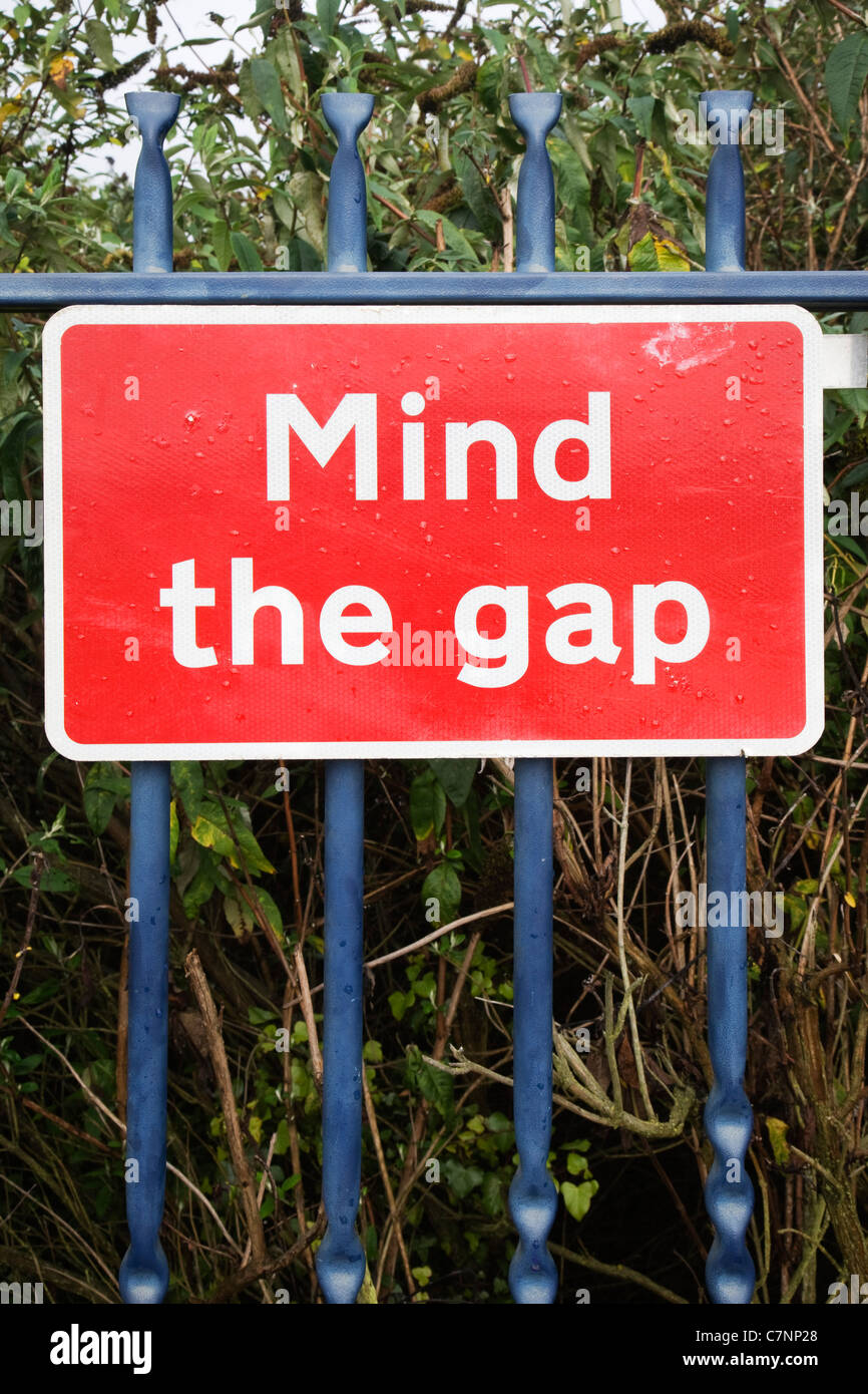 Mind the gap - railway sign. Stock Photo