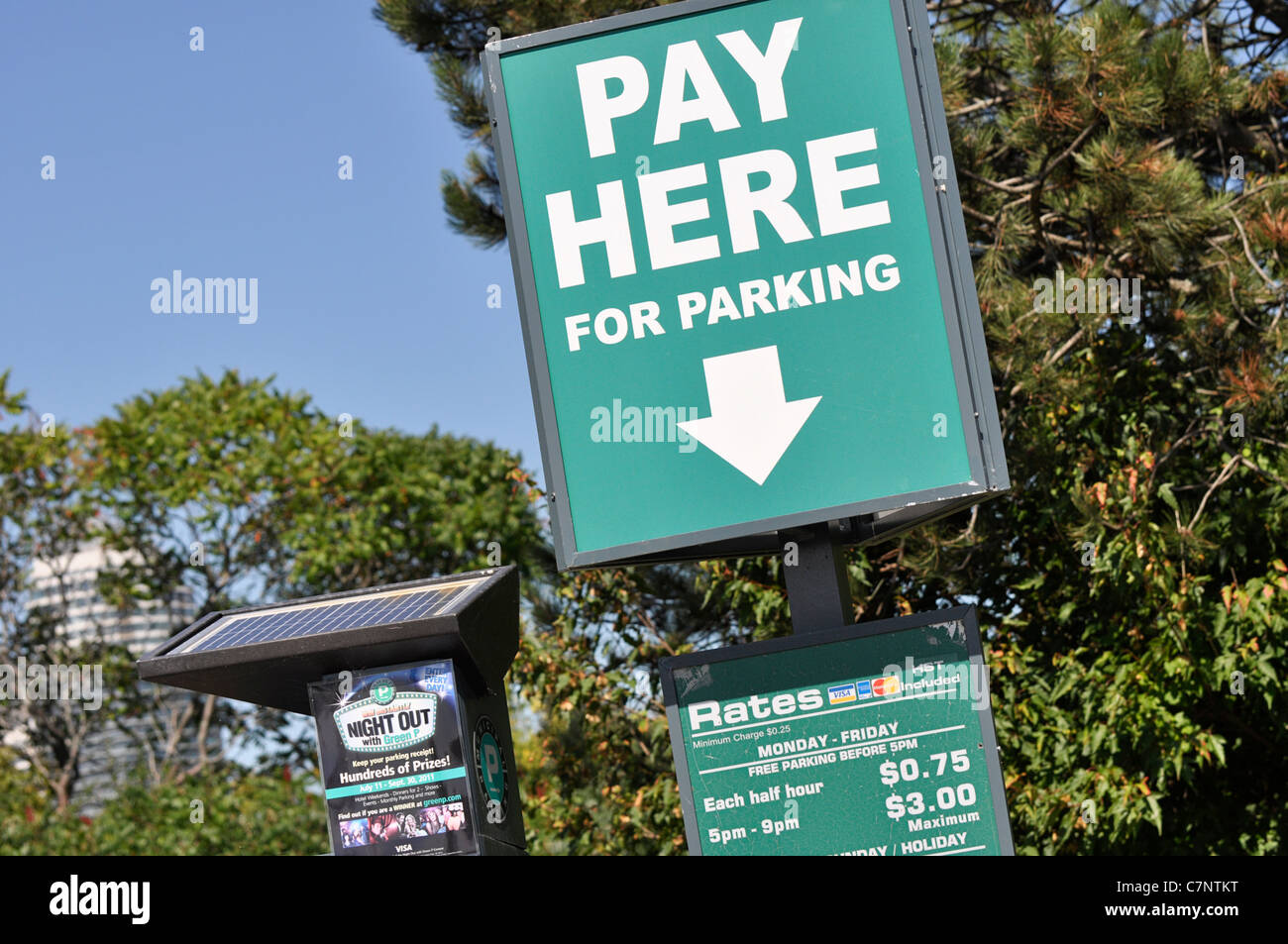Sign, Pay Here for Parking Stock Photo