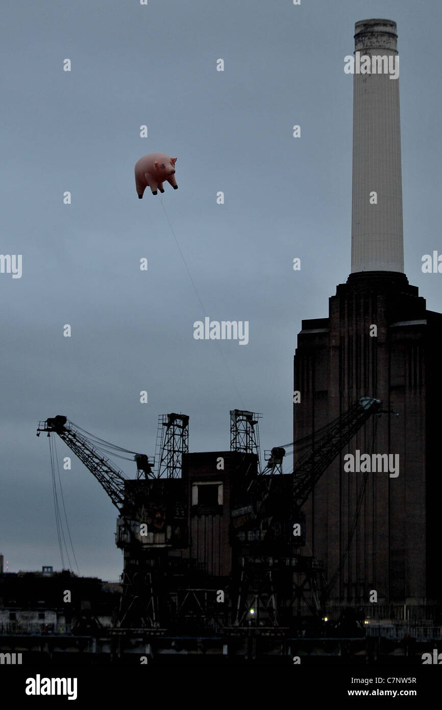 Pigs on a wing. Pink Floyd fly their iconic pig over Battersea Power ...