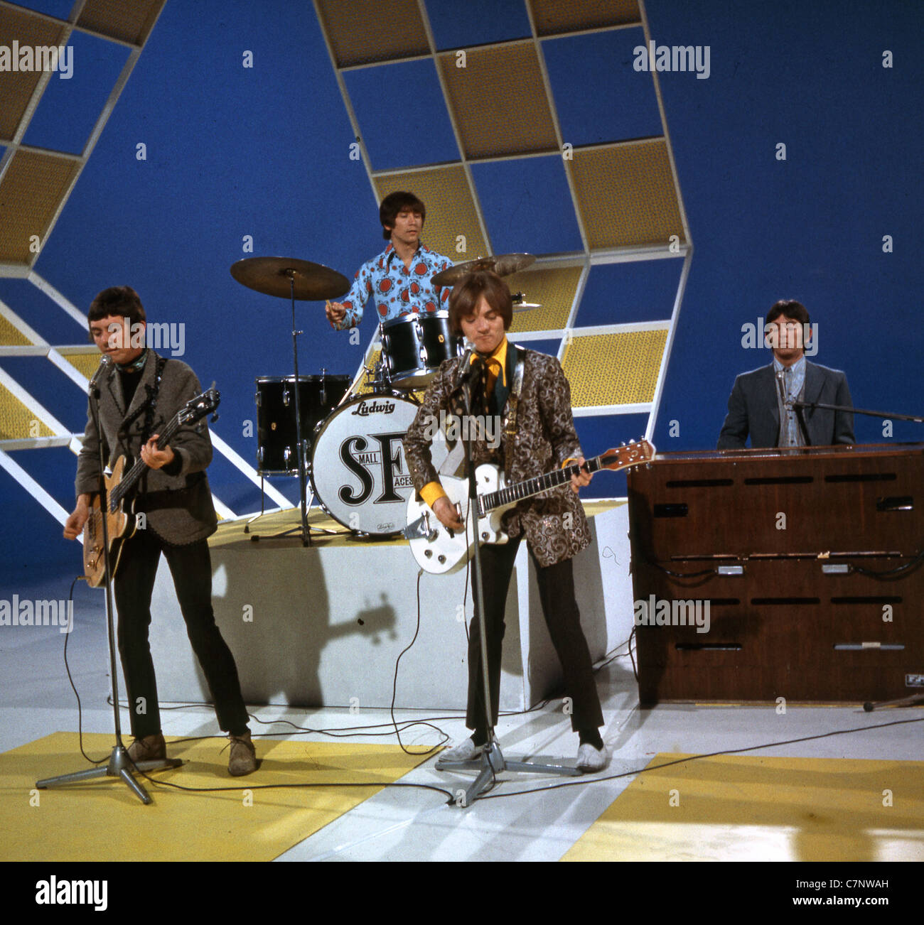 SMALL FACES UK group on Top Of The Pops in 1966. From l: Ronnie Lane, Kenny Jones, Steve Marriott, Ian McLagan Stock Photo