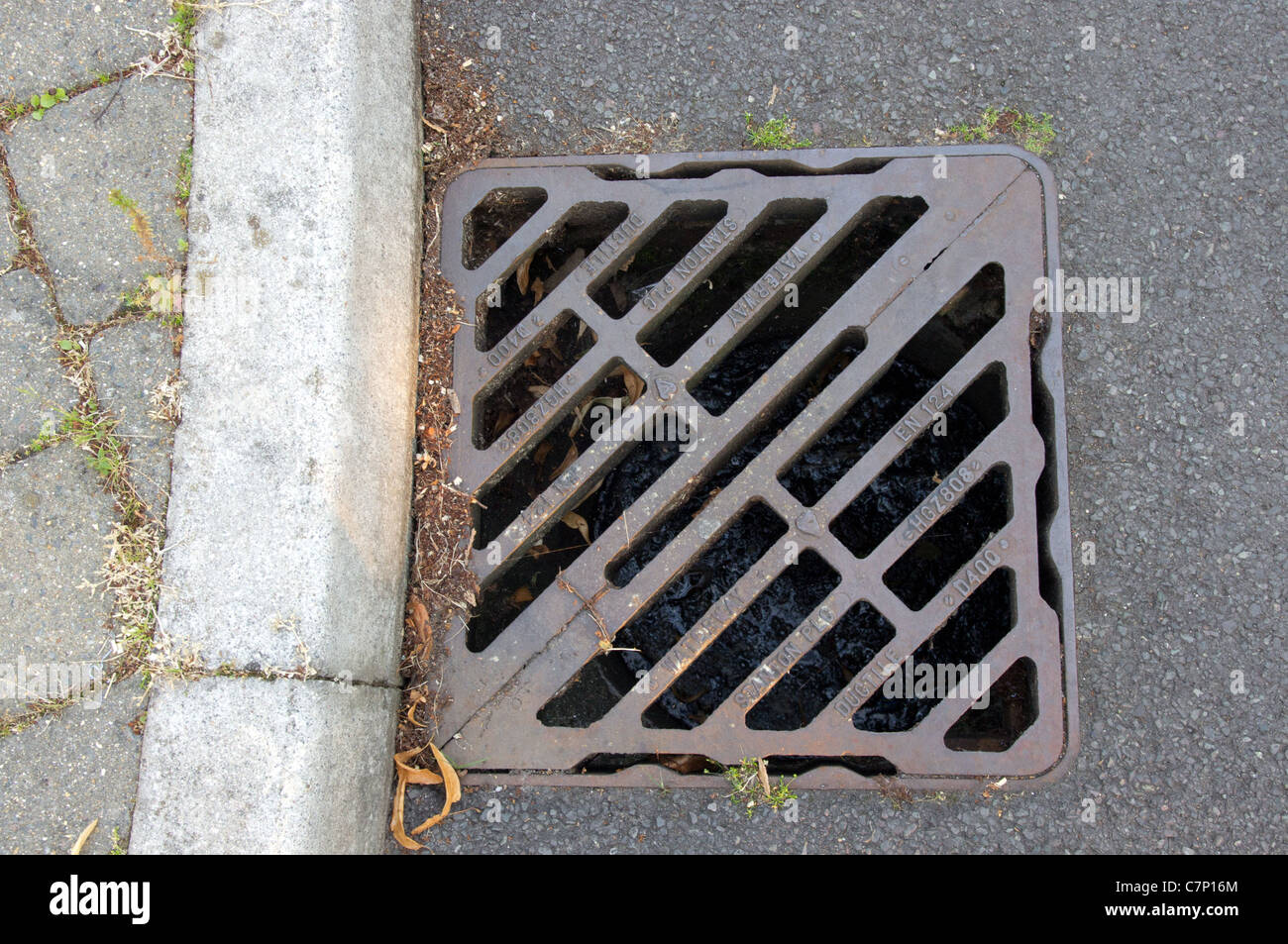 Drain cover on UK highway Stock Photo Alamy