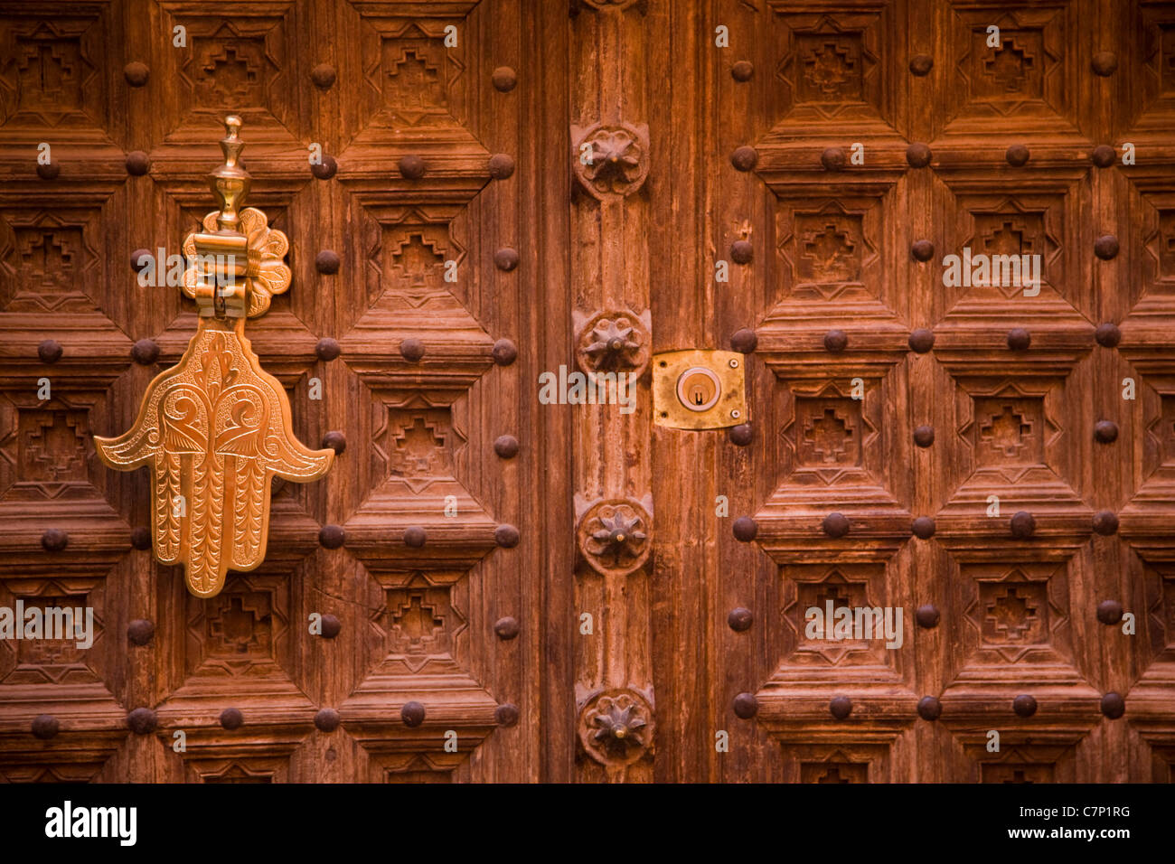 The beautiful carved decoration on the door of a house in Marrakech Stock Photo