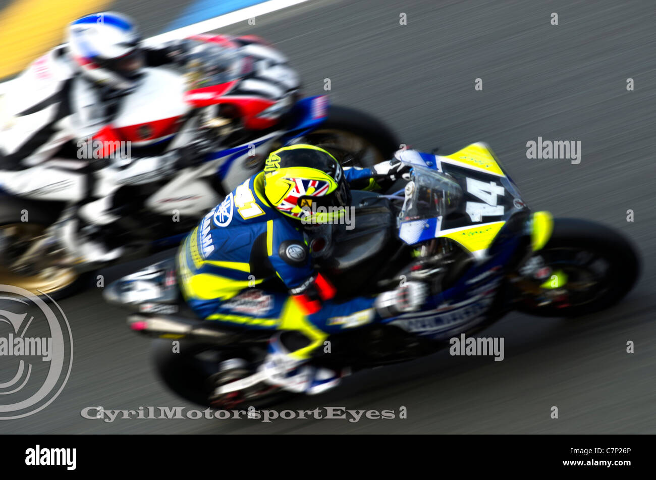 Yamaha 14 passing the Honda 6 during the 24 hours of Le Mans 2011 Stock Photo