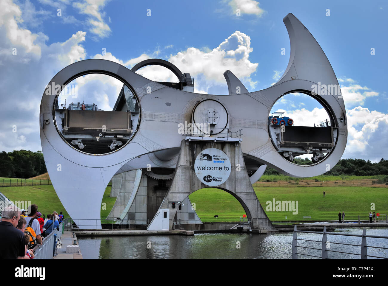 The Falkirk Wheel is a rotating boat lift in central Scotland, connecting the Forth and Clyde Canal with the Union Canal in Scotland, UK, Europe Stock Photo