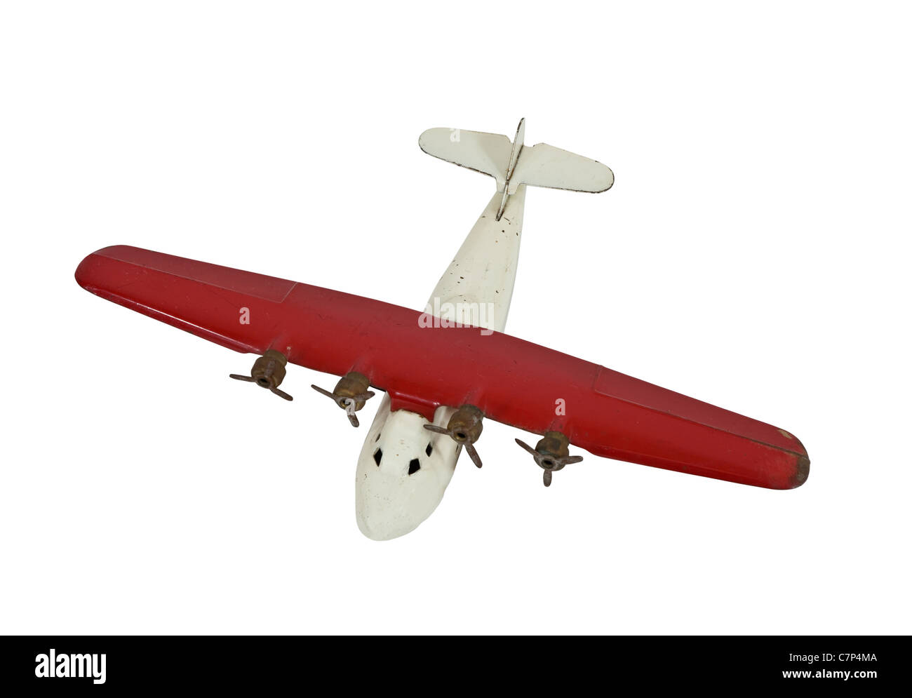 Vintage metal toy plane isolated on white. Stock Photo