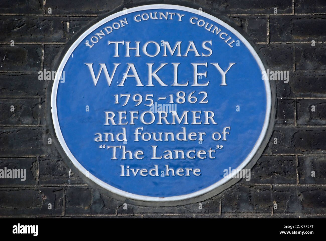 london county council blue plaque marking a home of thomas wakley, founder of the lancet magazine, bedford square, london Stock Photo