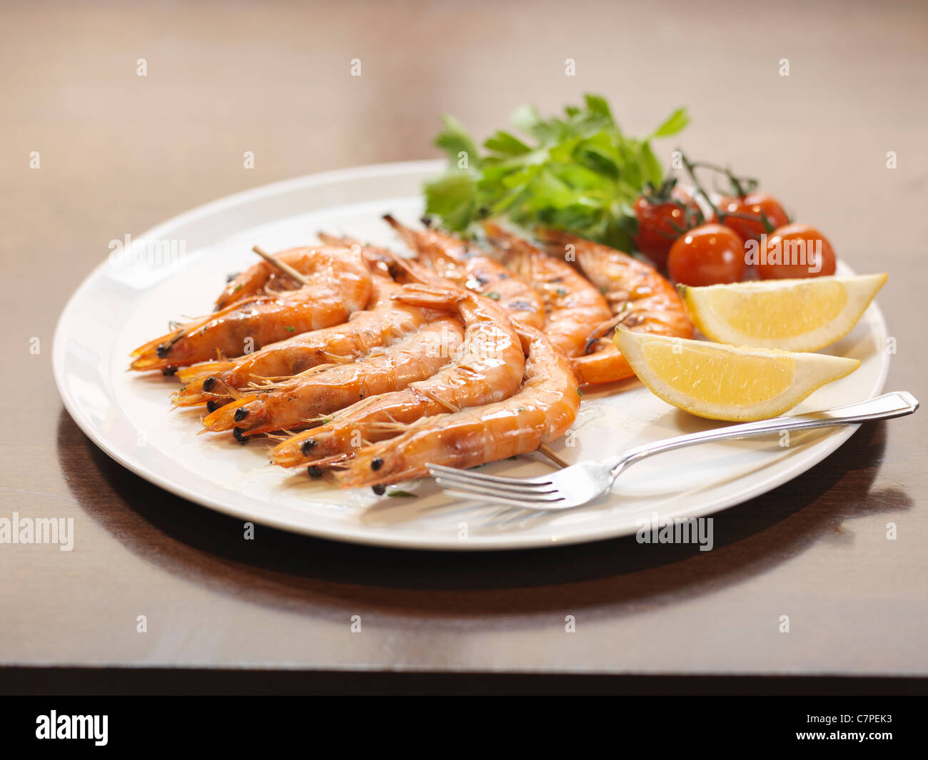 Plate of prawns at restaurant Stock Photo