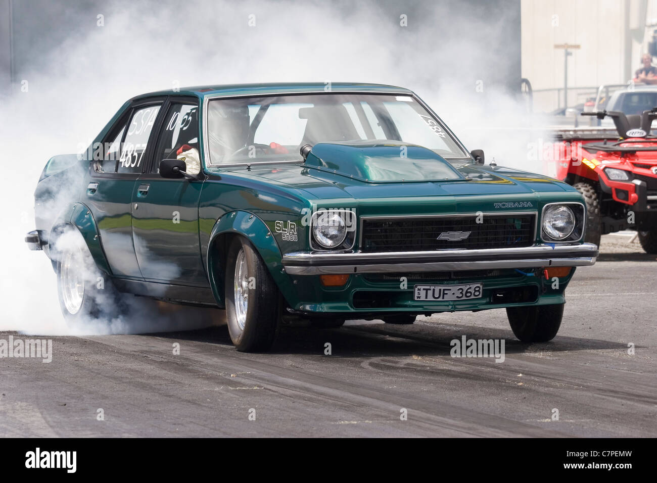 An iconic Australian Holden Torana car performing a tire warming