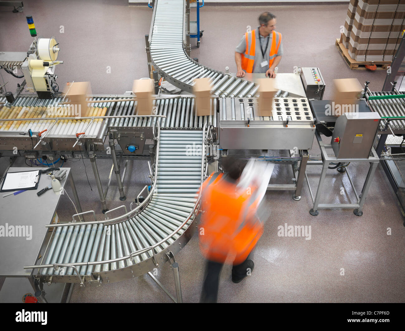 Factory workers in bottling plant Stock Photo