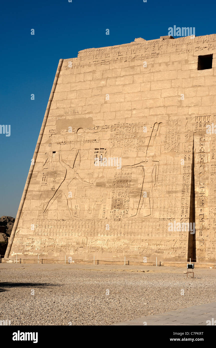 Relief of Ramses III on first pylon of Medinet Habu Temple, Luxor ...