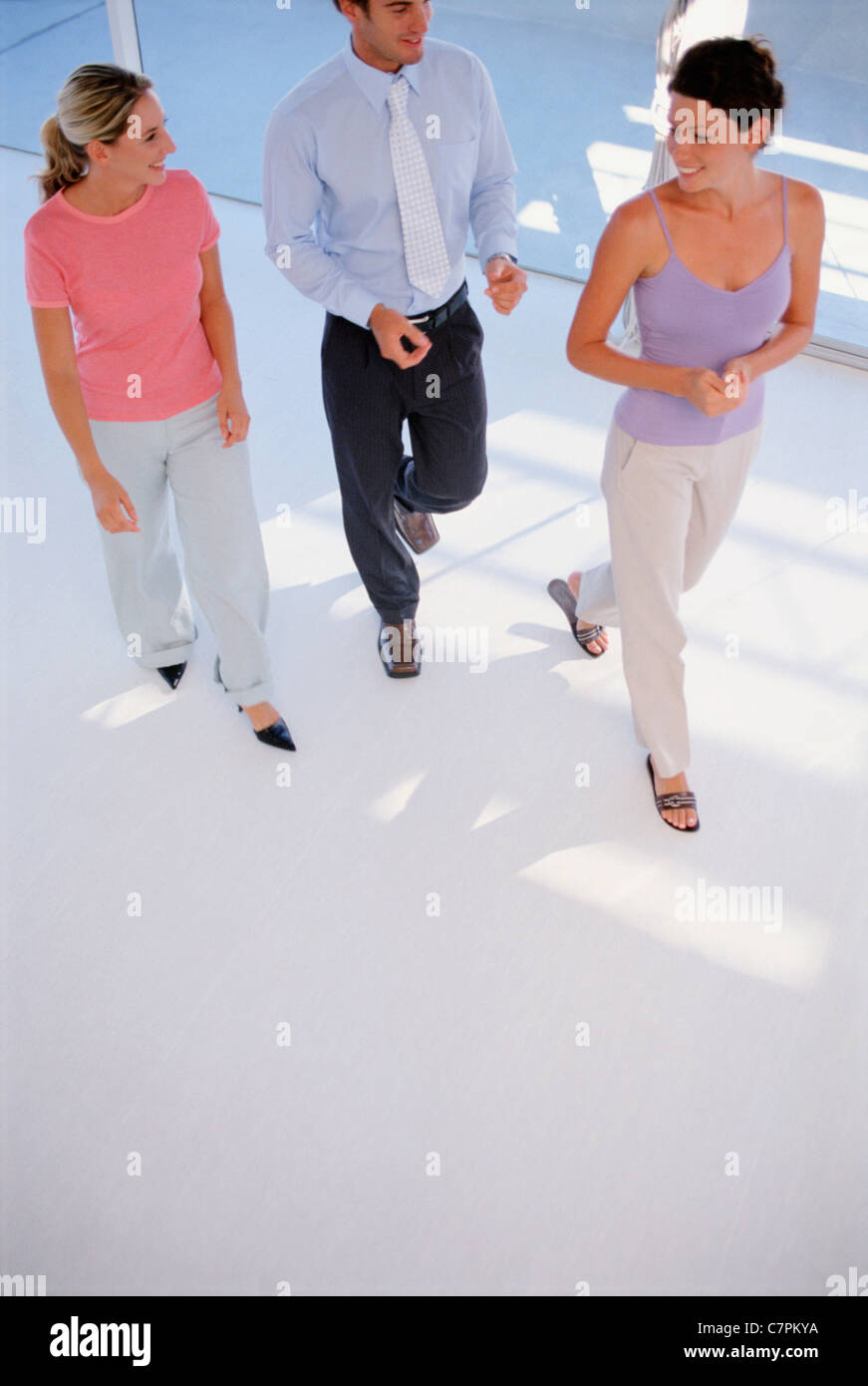 Business people walking together Stock Photo - Alamy