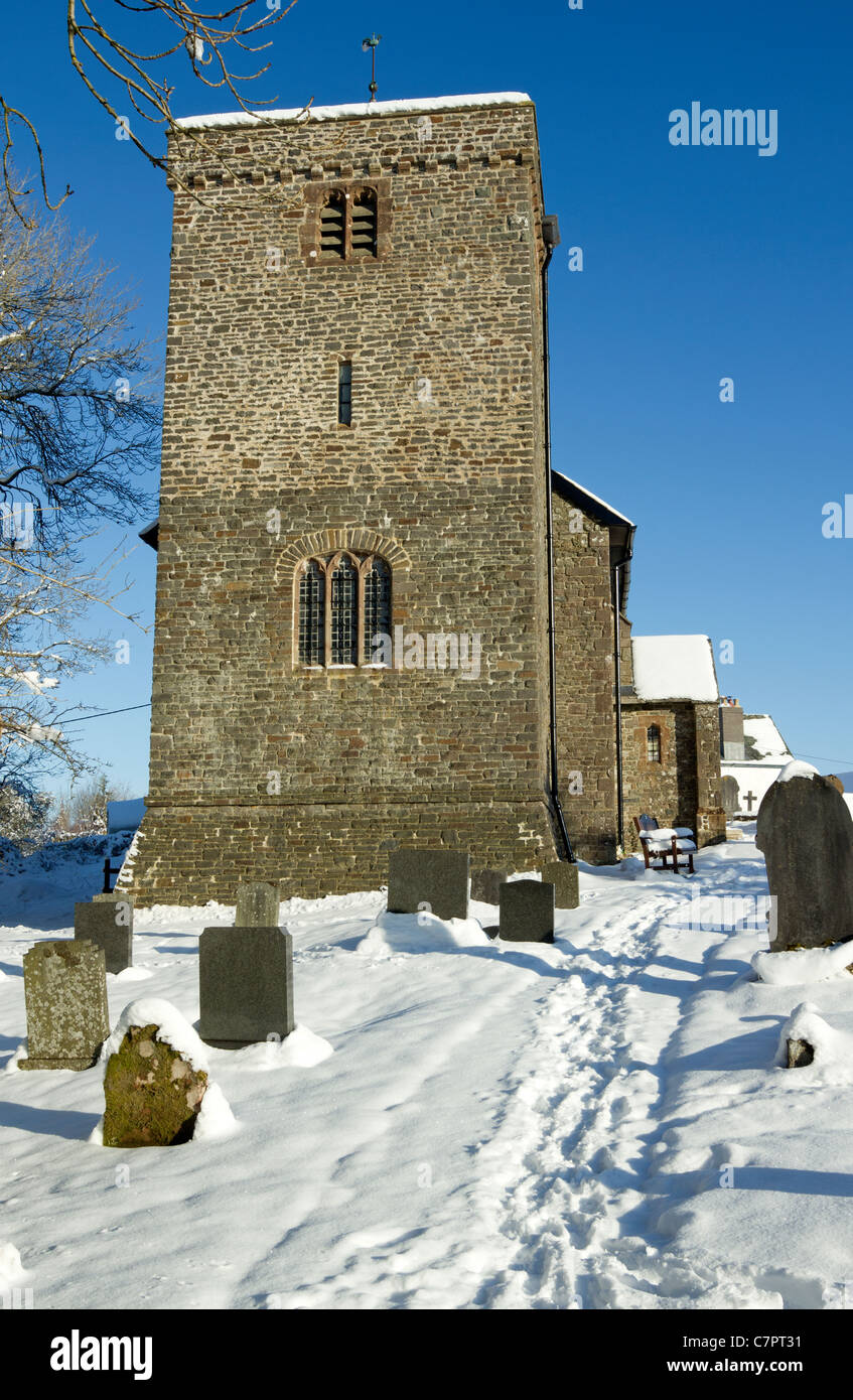 Church of St Cadmarch in the snow , Llangammarch Wells, Powys Wales. Stock Photo