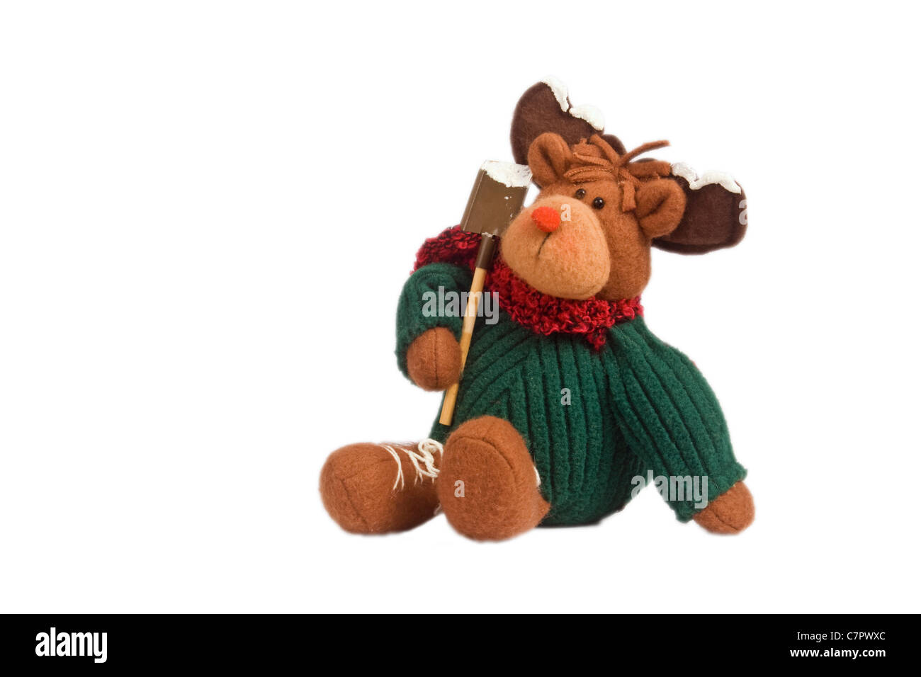 Soft toy of Rudolph the red nosed reindeer carrying a spade, with a white background. Stock Photo