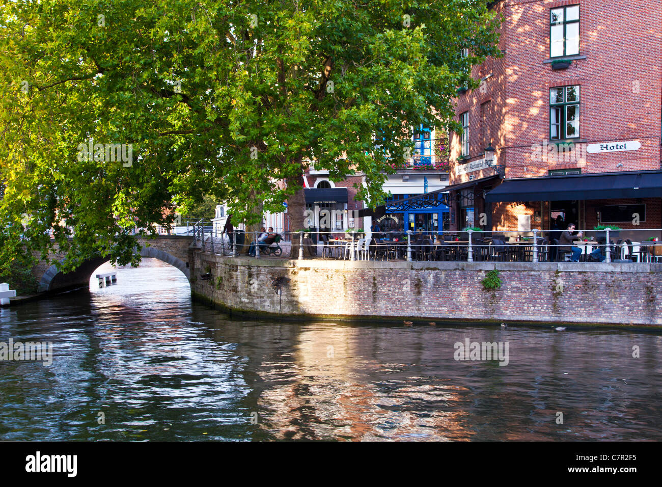 Canal and bridge in Bruges, Belgium from the Groene Rei or Green Bank Stock Photo