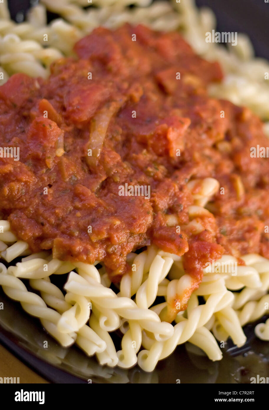 A delicious homemade Italian meal. Gemelli pasta with fresh homemade marinara sauce. Stock Photo