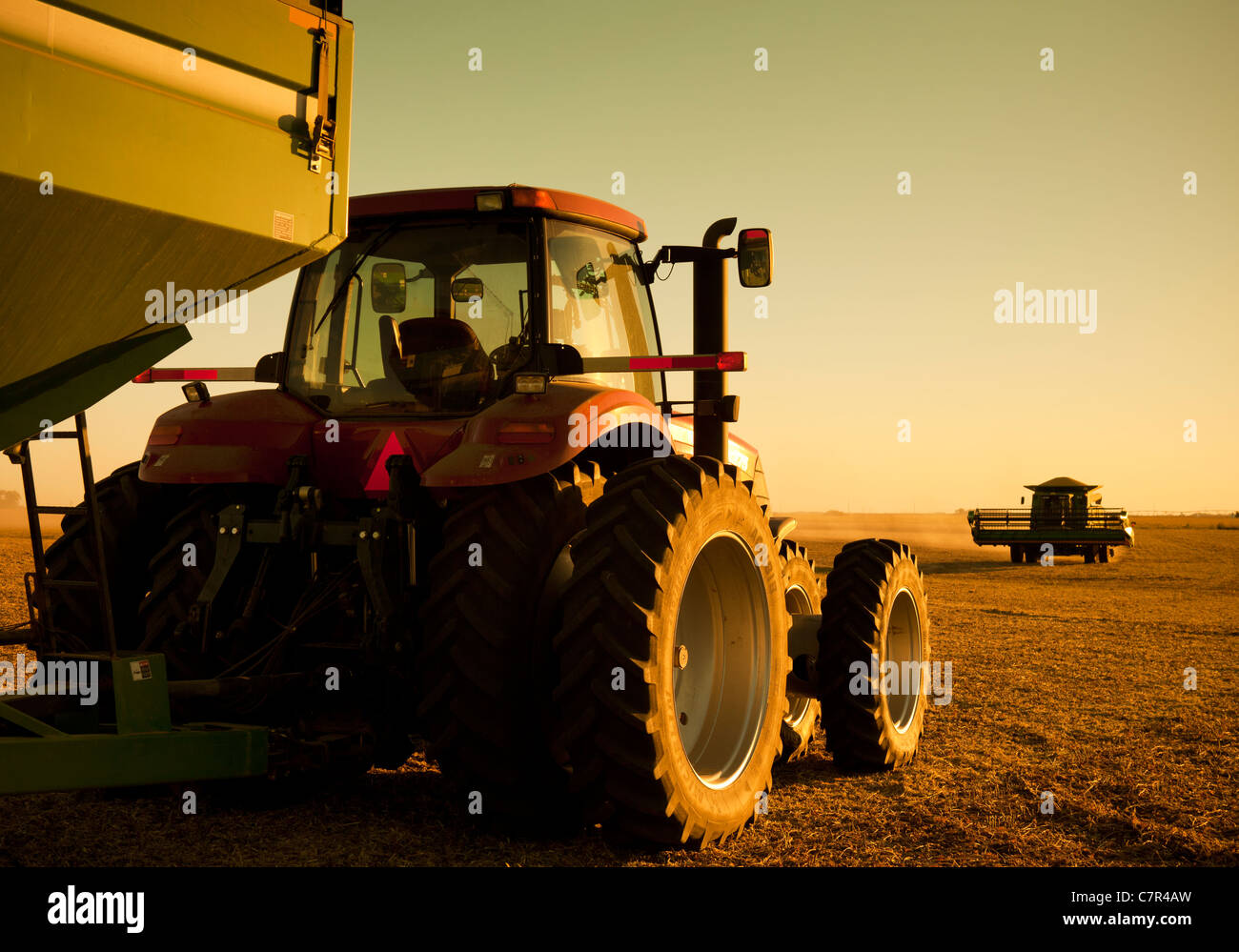 Farm Tractor and Combine Stock Photo