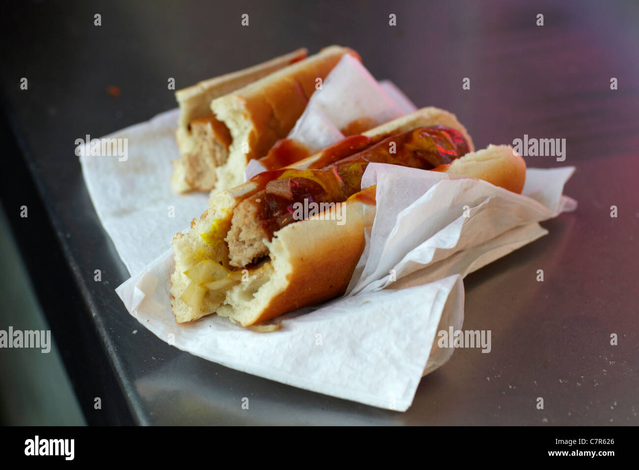Half eaten hot dog Stock Photo