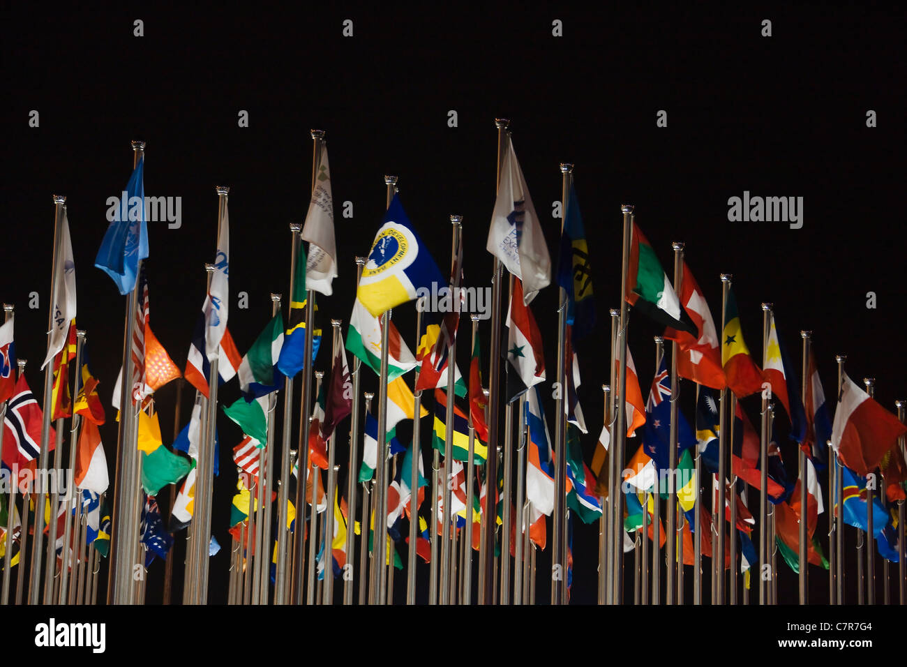 Night view of flag poles at 2010 World Expo, Shanghai, China Stock Photo