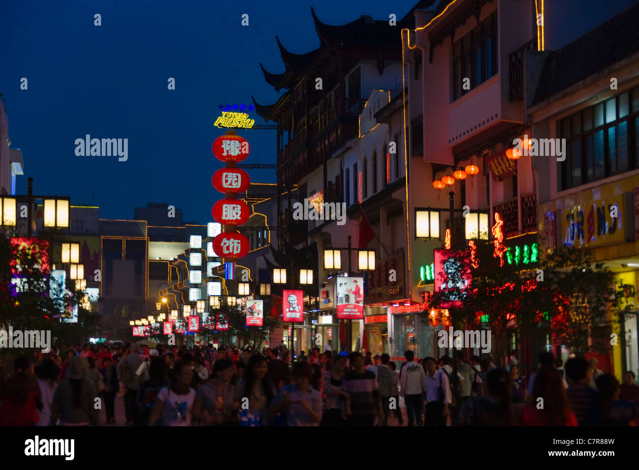 Night view of shops along Guanqian Street, Suzhou, Jiangsu, China Stock Photo