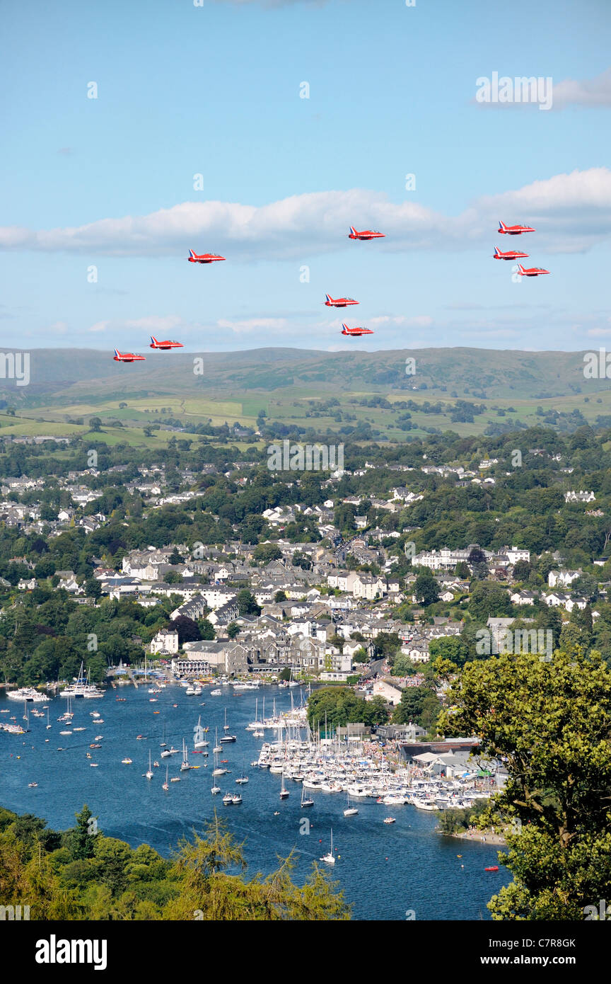 Red Arrows Royal Air Force Aerobatic Team fly in formation above Bowness during Windermere Air Festival, Cumbria, UK Stock Photo