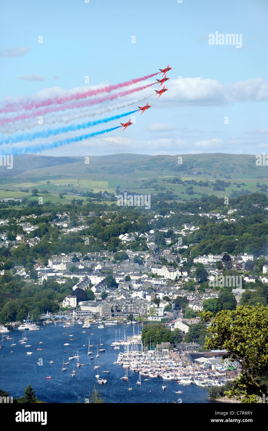 Red Arrows Royal Air Force Aerobatic Team fly in formation above Bowness during Windermere Air Festival, Cumbria, UK Stock Photo