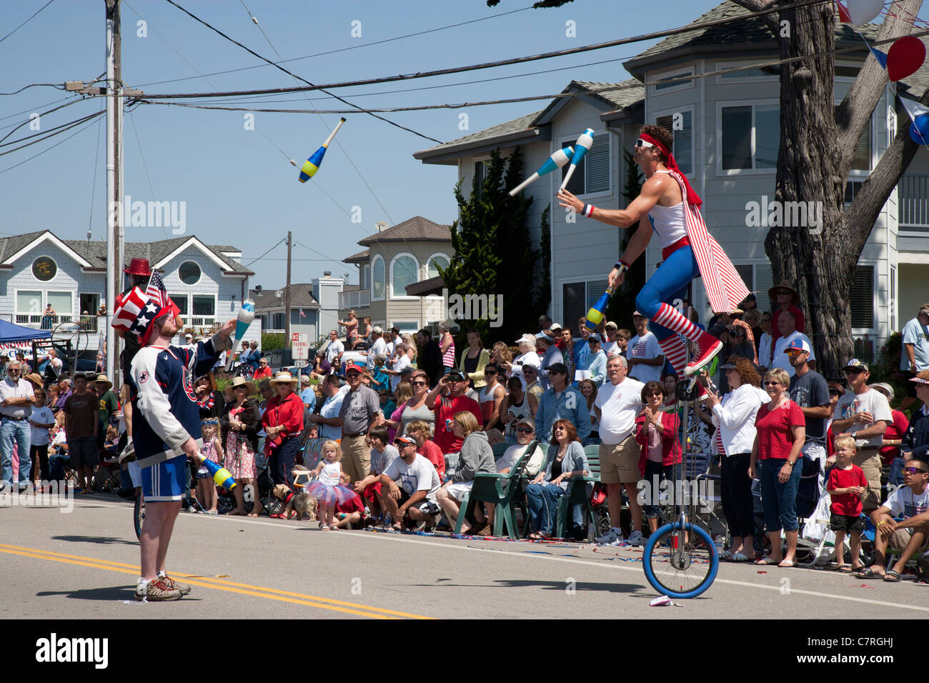 Juggler on a Unicycle at Fourth of July Parade Stock Photo Alamy