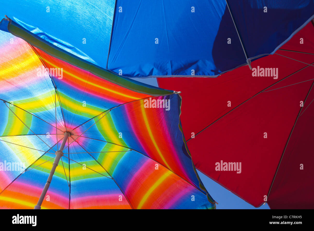 Colourful beach umbrellas Stock Photo