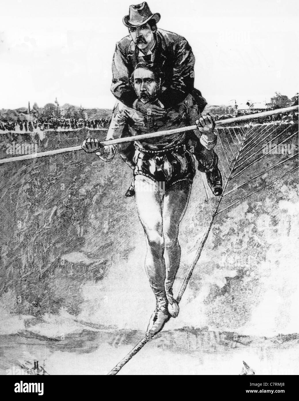 CHARLES BLONDIN (1824-1897) carries his manager  Harry Colford over the gorge of the Niagara River in 1859 Stock Photo
