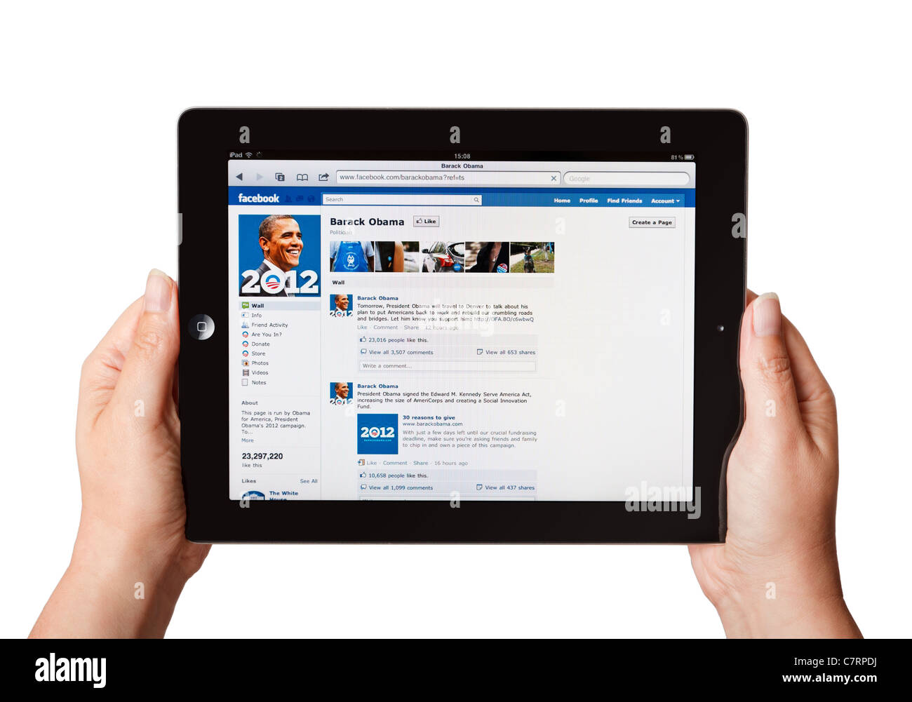 Hands holding iPad showing Barack Obama's political campaign Facebook page Stock Photo