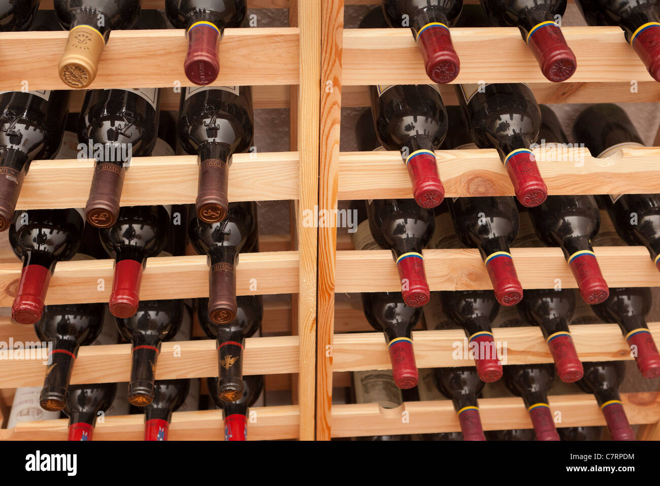 Wine bottles in a wine cellar Stock Photo