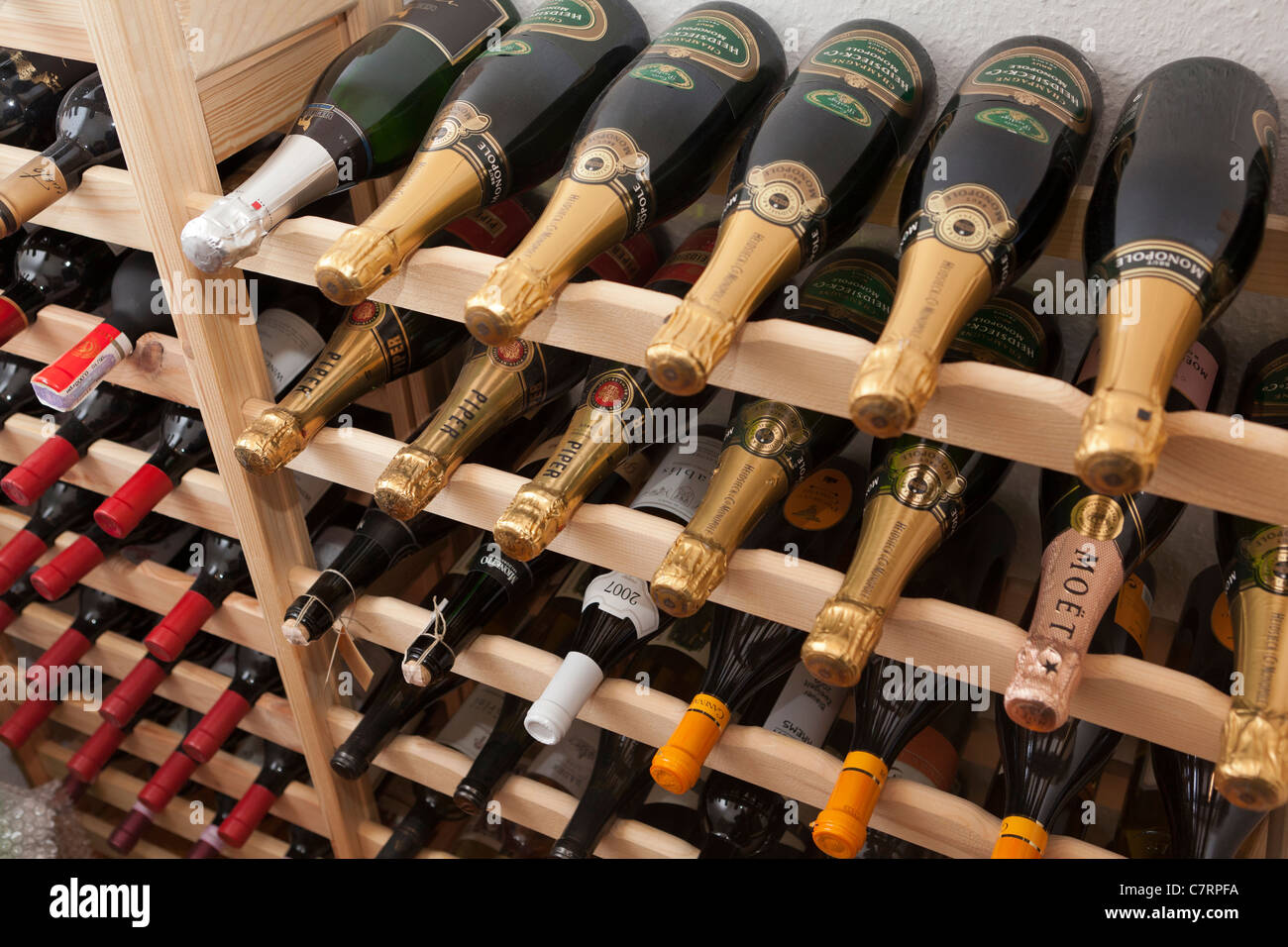 Wine bottles in a wine cellar Stock Photo